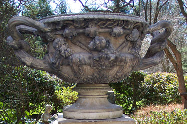 20TH CENTURY 52-INCH-WIDE ENGLISH STONEWARE EXAMPLE OF THE 'WARWICK URN'